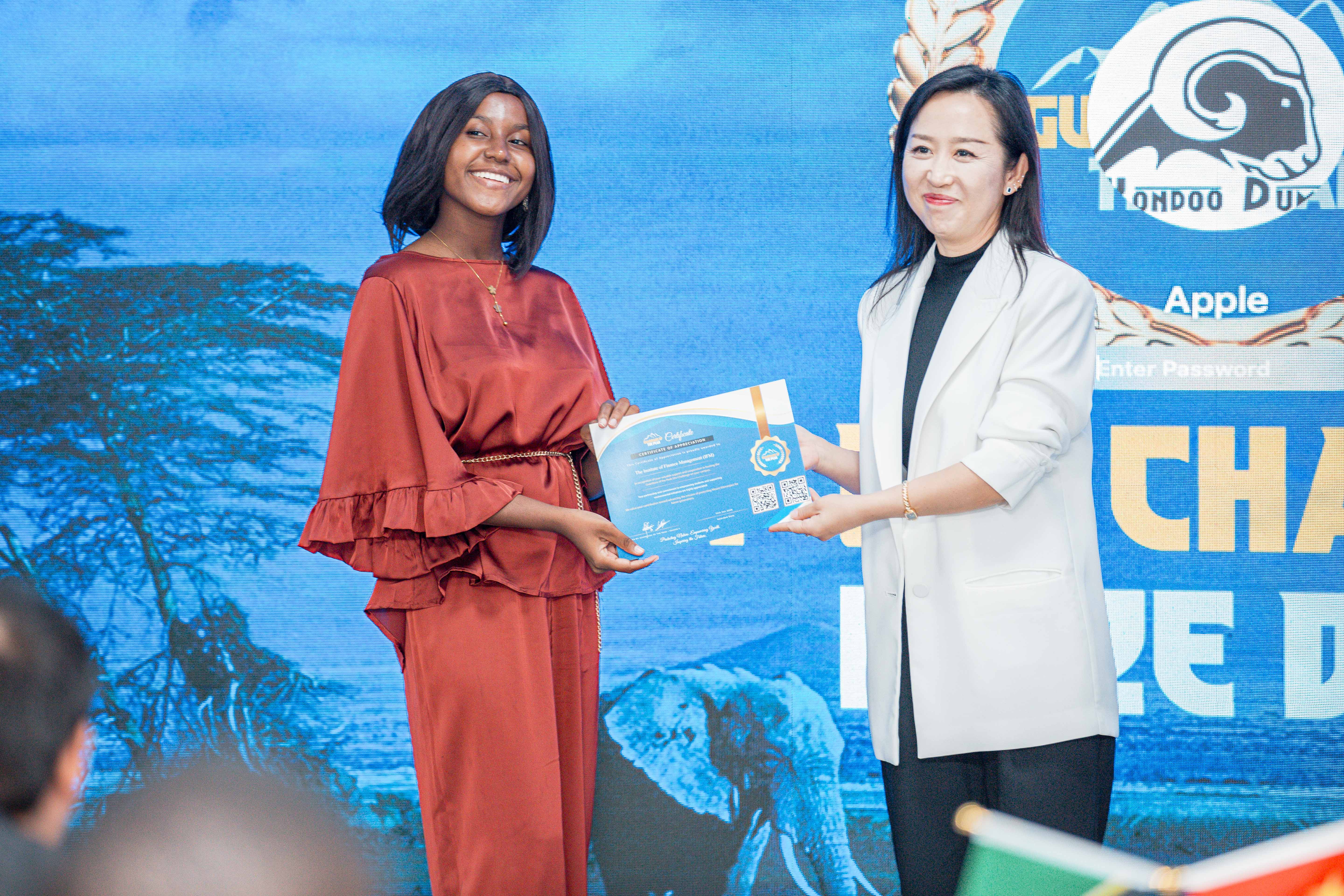 University Students receive Guardians of the Peak certificates.